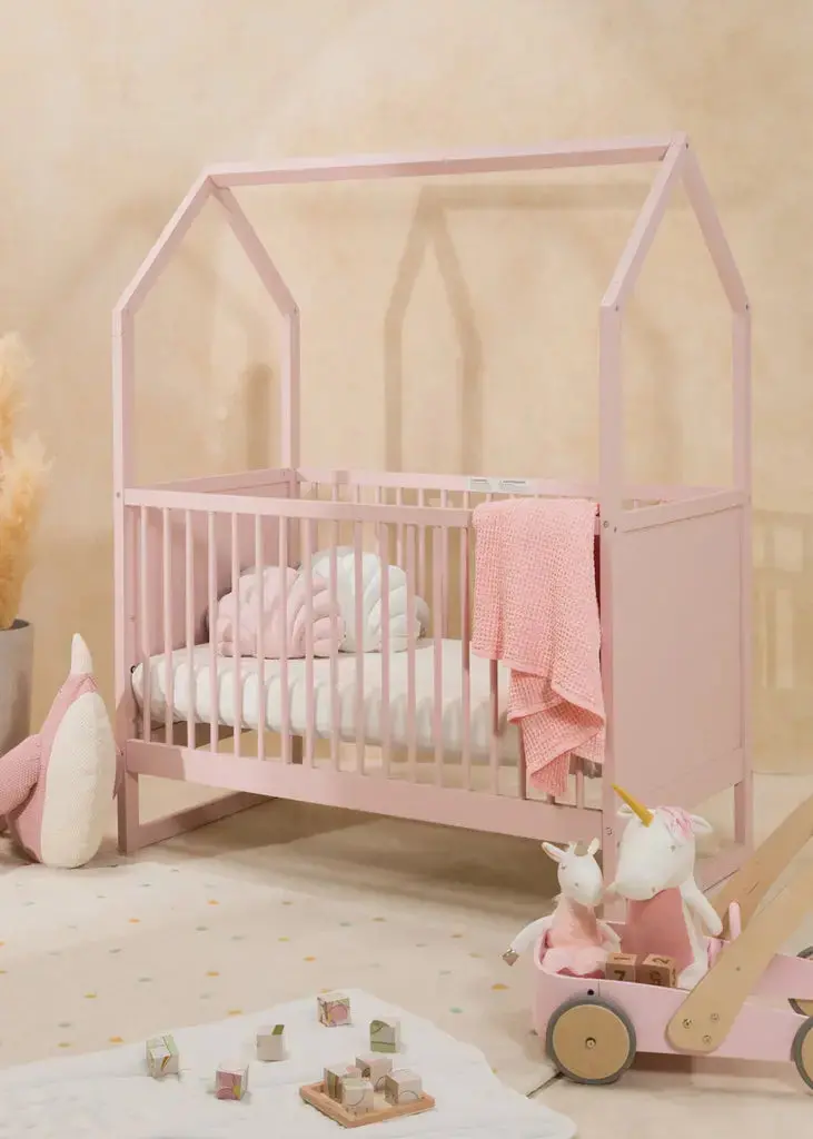 Pink Wooden Baby Crib With Modern House Design 1